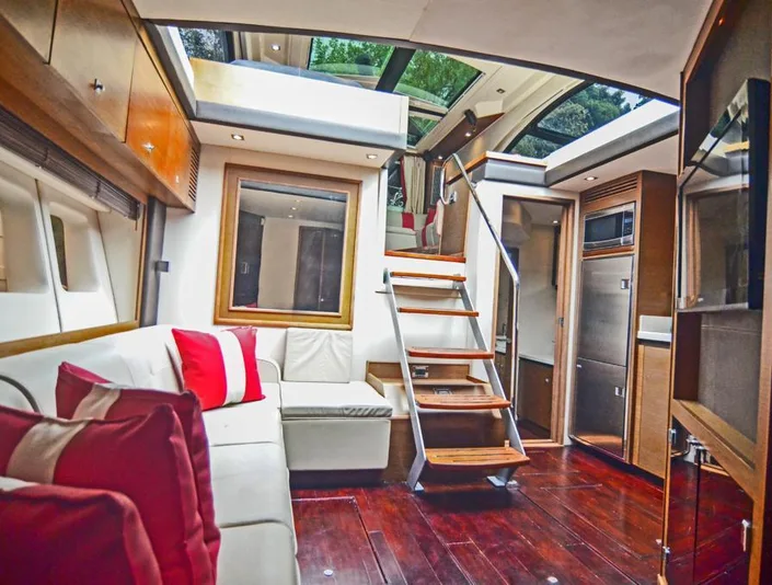 Sea Ray 53 salon with red and white seating