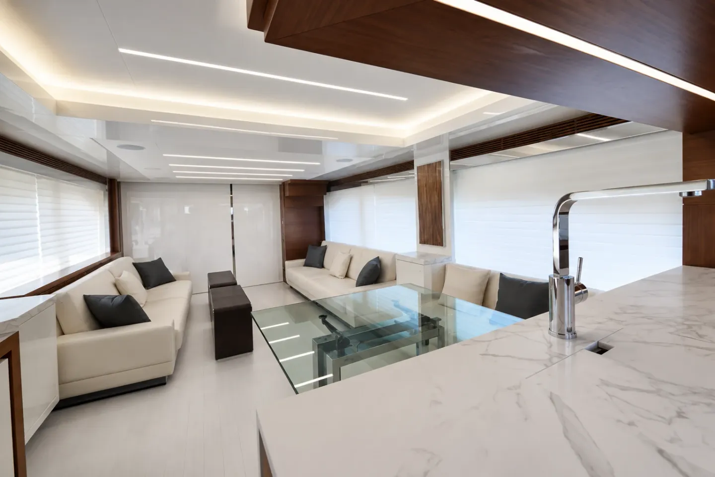 Astondoa 80 bright salon with sofas and a glass table