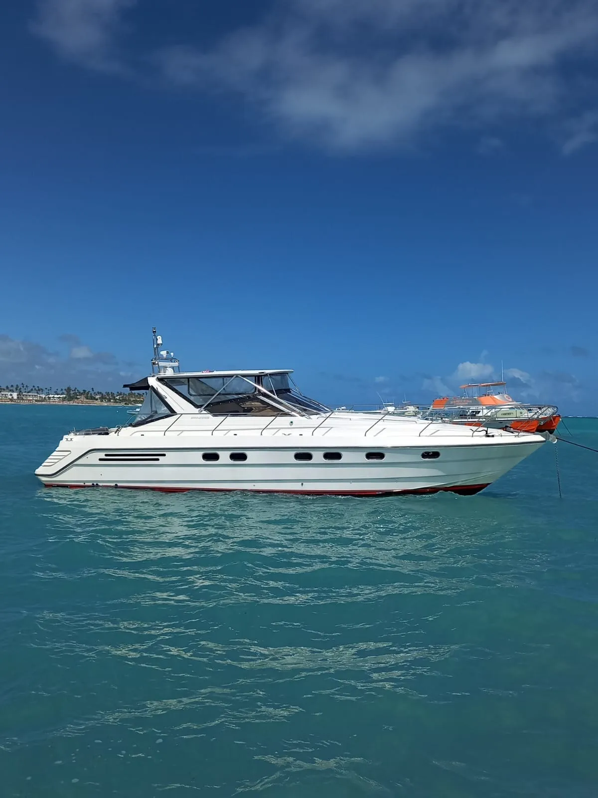The Princess 49 anchored in turquoise water