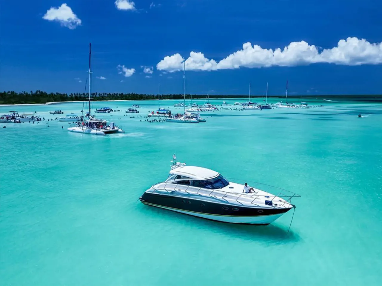 The Princess 60 anchored in turquoise water