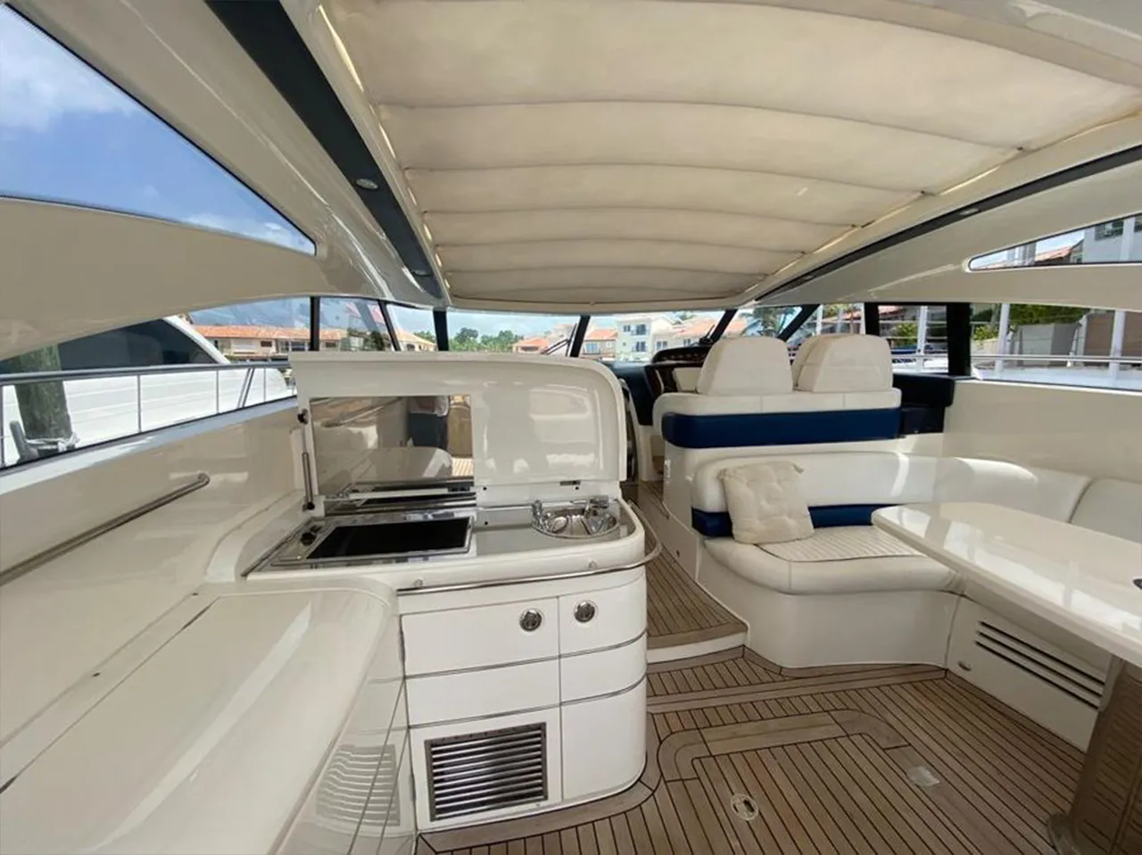 Princess 60 covered seating area with a table