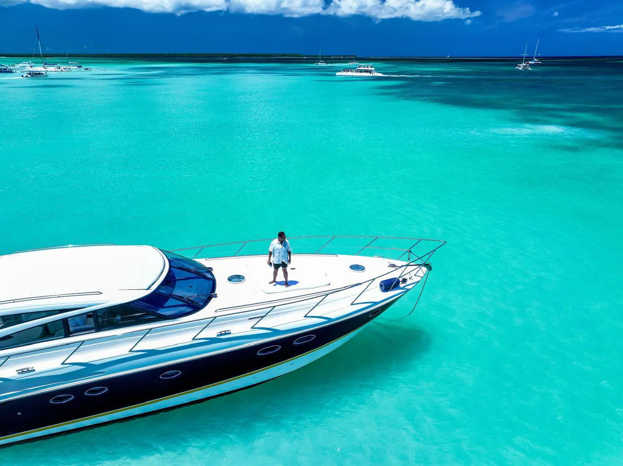 Princess 60 foredeck and sunpads above turquoise water
