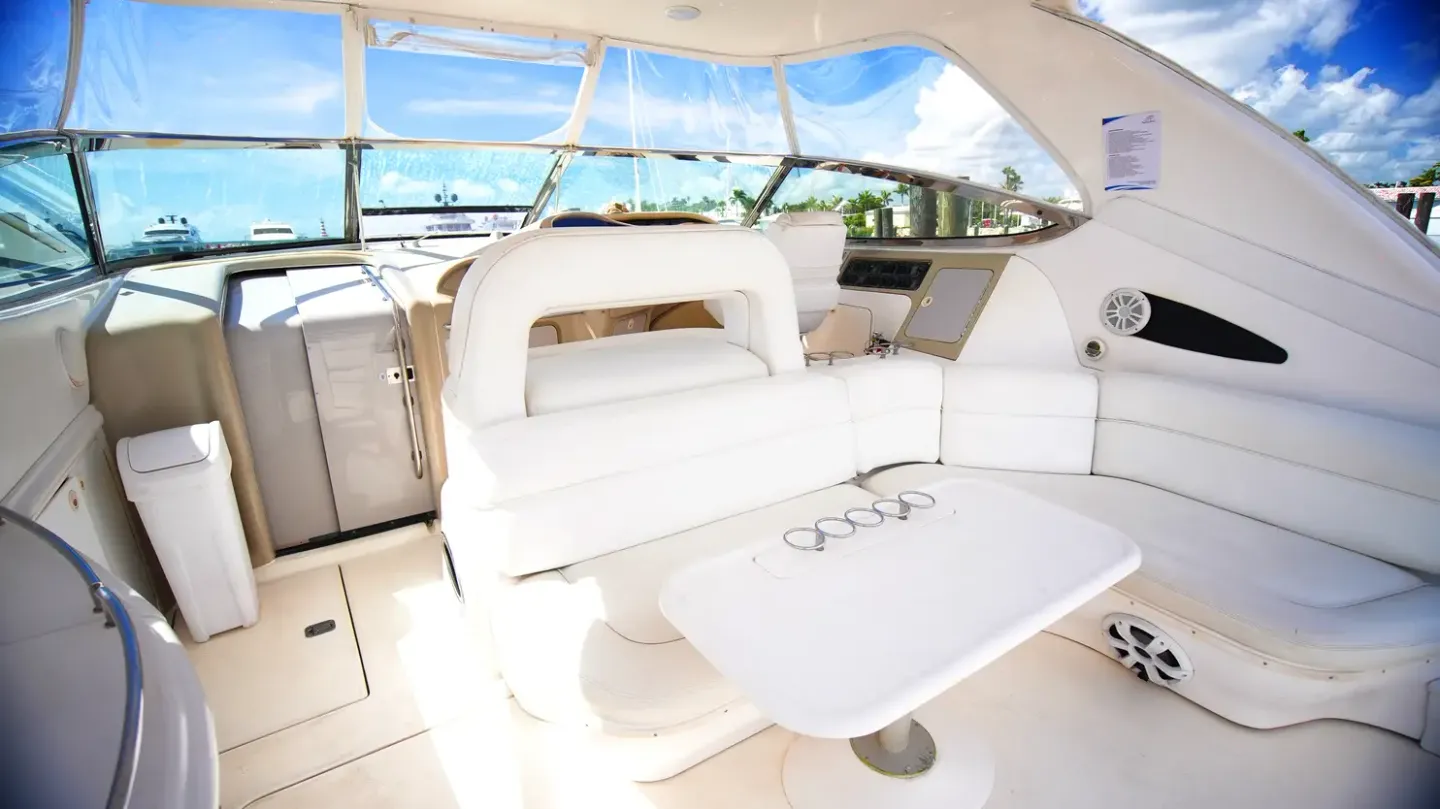 Sea Ray 54 covered seating area with a table