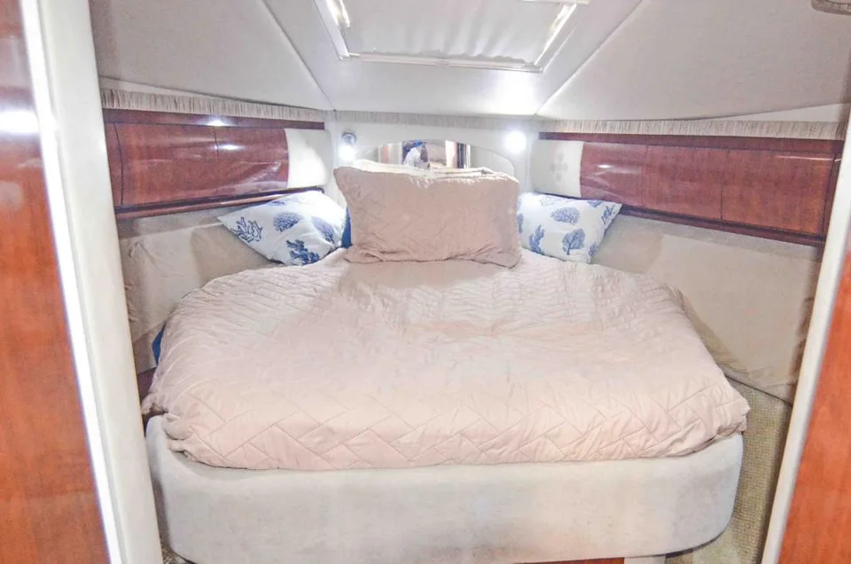 Sea Ray 42 forward cabin with a double berth and overhead hatch