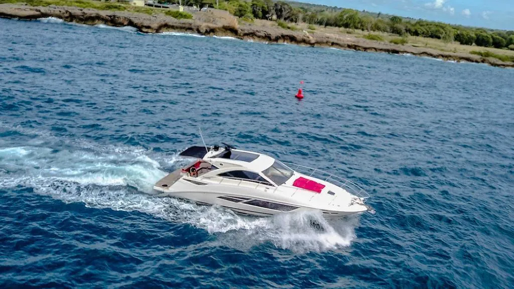 Sea Ray 53 cruising along the coast