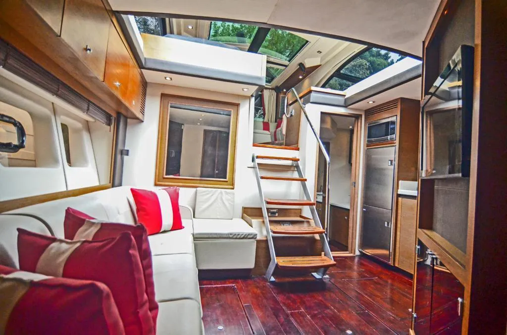 Sea Ray 53 salon with red and white seating