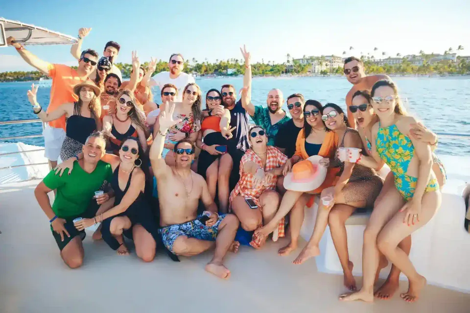 Friends celebrating together on a boat
